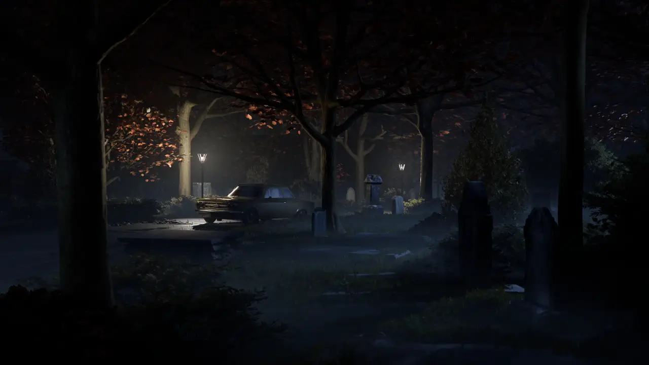 Official night screenshot of a foggy Haddonfield cemetery with a period sedan beside lamp posts